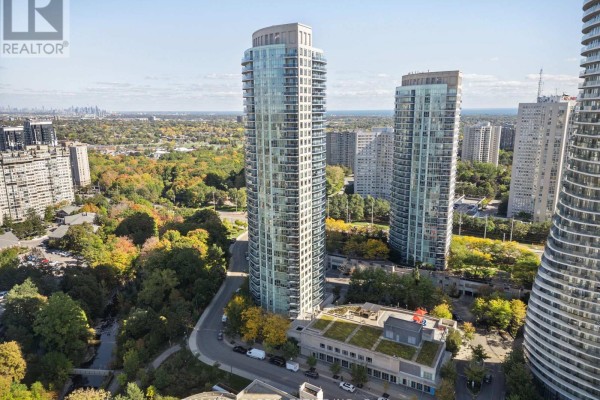 Aerial view of high-rise buildings and surrounding parkland on an autumn day. - 1805 - 80 Absolute Avenue S, Mississauga