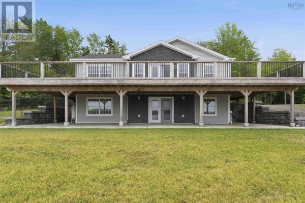 Home office featuring a desk, bookshelves, and treadmill - 181 Timberland Road, South Range