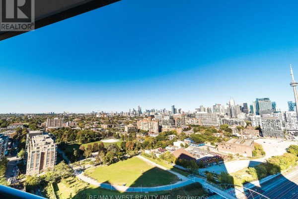 View of Toronto skyline and park from a high-rise apartment. - 1810 - 50 Ordnance Street, Toronto