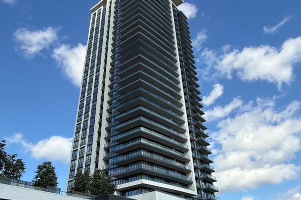 Exterior of a modern high-rise condominium building with many balconies. - 1812 - 38 Gandhi Lane, Markham