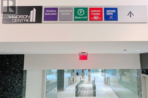 Interior signage for Madison Centre, subway, and parking facilities. - 1812 - 4978 Yonge Street, Toronto