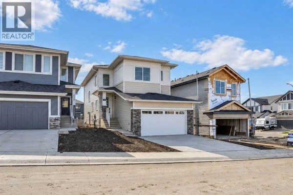 Living room - 183 Heritage Court, Cochrane, AB T4C2N5 Photo 4