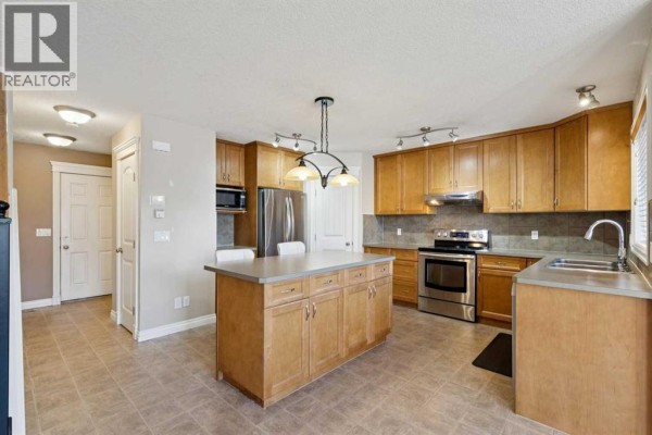 Living room - 184 Cimarron Park Circle, Okotoks, AB T1S2H5 Photo 3