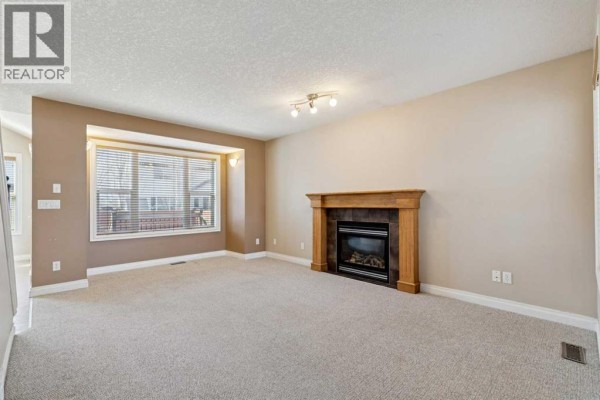 Family room - 184 Cimarron Park Circle, Okotoks, AB T1S2H5 Photo 4