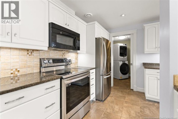 Kitchen - 185 Royal Oaks Boulevard Unit# 210, Moncton, NB E1H2P7 Photo 5