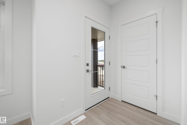 Primary Bedroom - 18709 18a Av Nw, Edmonton, AB T6N0B2 Photo 4