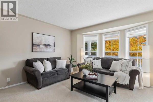 Living room - 189 Tuscany Valley Way Nw, Calgary, AB T3L2A7 Photo 4