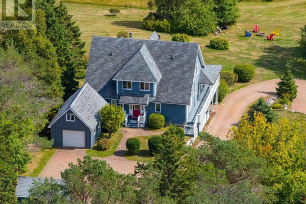 Top-down view of the house with a circular driveway and surrounding gardens. - 19 Graves Island Road, East Chester