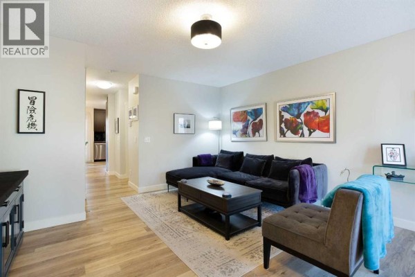 Living room - 1907, 2445 Kingsland Road Se, Airdrie, AB T4A0B5 Photo 3