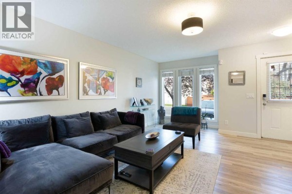 Living room - 1907, 2445 Kingsland Road Se, Airdrie, AB T4A0B5 Photo 4