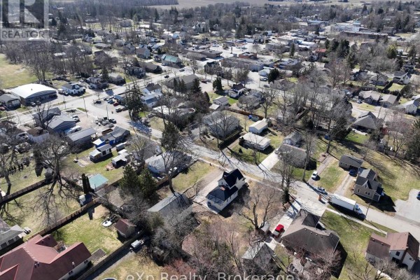 Aerial view of a residential neighborhood with houses and roads - 192 William Street W North Middlesex