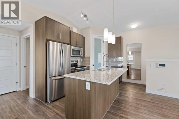 Kitchen - 1921, 2461 Baysprings Link Sw, Airdrie, AB T4B4C6 Photo 3