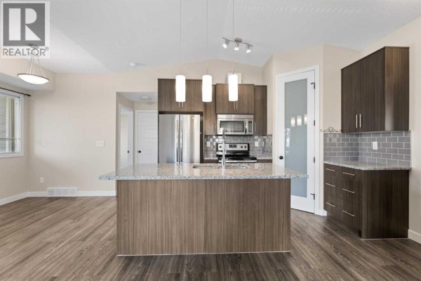 Primary Bedroom - 1921, 2461 Baysprings Link Sw, Airdrie, AB T4B4C6 Photo 5