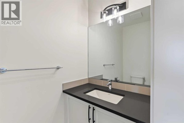 2pc Bathroom - 193 Bridgeport Gate, Chestermere, AB T1X3E2 Photo 4