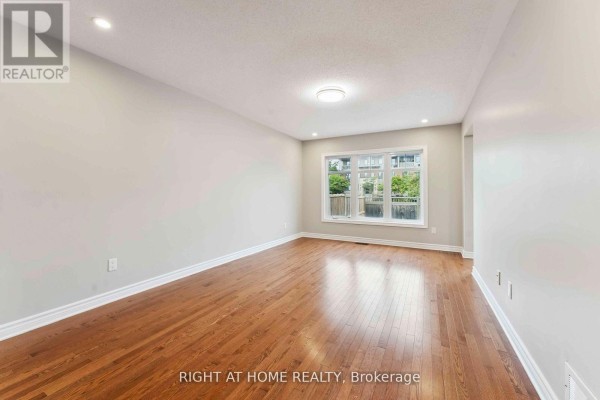 Living room - 195 Mancini Way, Ottawa, ON K2J5X4 Photo 5