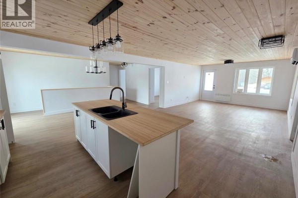 Master bathroom with freestanding tub, glass shower enclosure, and toilet. - 195 Principale Street, Sainte Anne De Madawaska