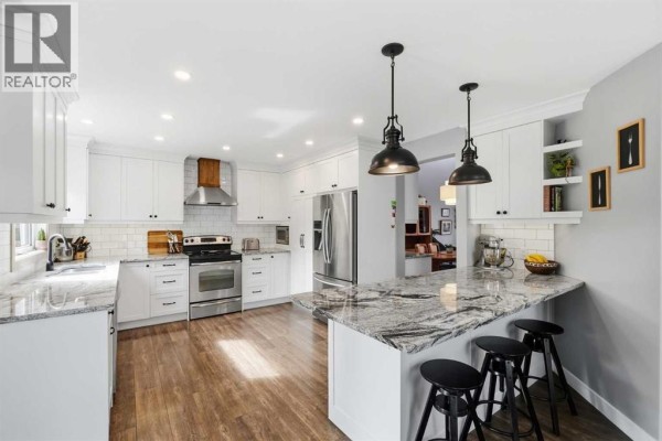 Family room - 196 Riverview Close Se, Calgary, AB T2C4C6 Photo 3