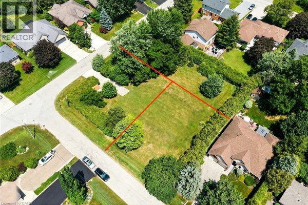 Aerial overview of a suburban neighborhood with several residential lots highlighted, bordered by streets, homes, and abundant trees. - 1b Westview Crescent, Waterdown