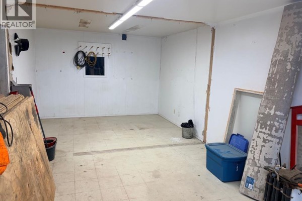 Interior view of an empty room with white walls, tiled floor, and a small window. - 2, 162 Hampshire Road, Hinton