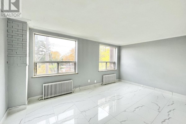 Living room - 2 - 2624 Eglinton Avenue E, Toronto, ON M1K2S3 Photo 2