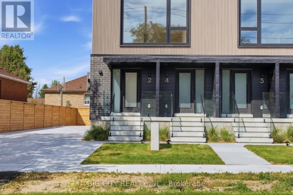 Close-up of townhouse entrances numbered 2, 4, and 3 with concrete steps and glass railings. - 2 - 276 Lanor Avenue, Toronto