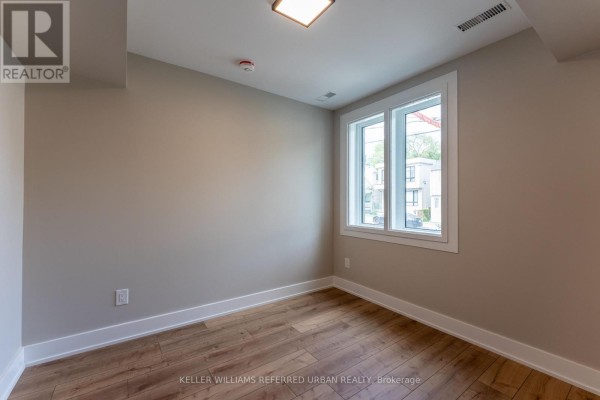 Bedroom 2 - 2 - 352 Jones Avenue, Toronto, ON M4J3G3 Photo 5