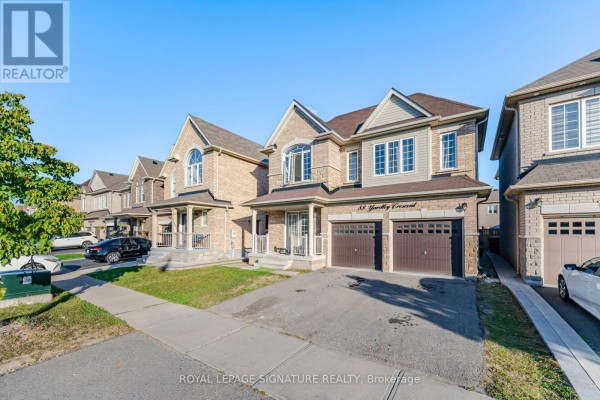 Side view of the stone and vinyl siding house showing adjacent properties and parked cars. - 2 - 88 Yardley Crescent, Brampton