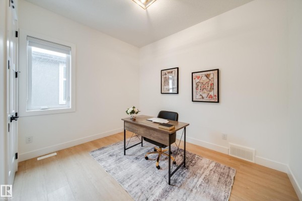 Family room - #2 20425 93 Av Nw, Edmonton, AB T5T7C7 Photo 4