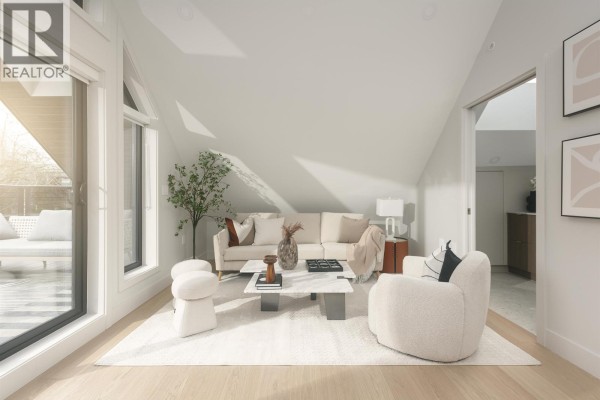 Spacious outdoor lounge area with sectional seating and coffee table, surrounded by trees - 2 2637 W 12th Avenue, Vancouver