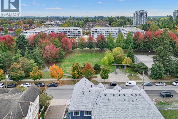 Aerial view showing Ferndale Garden IV townhouses adjacent to Katsura Park and surrounding residential buildings. - 2 9331 Ferndale Road, Richmond