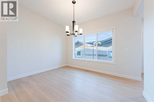 2pc Bathroom - 2 Fireside Close, Cochrane, AB T4C3E1 Photo 5