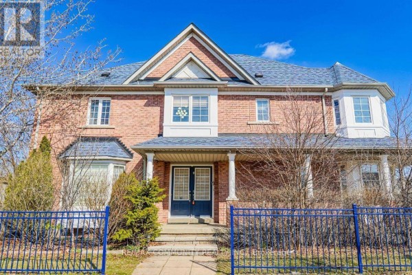 Front entrance of a brick townhouse with a covered porch and double glass doors. - 2 Oglevie Drive, Whitby