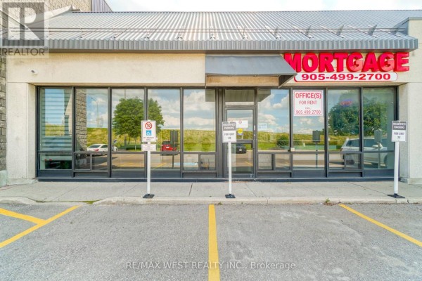 Entrance of mortgage office with signage and glass doors - 20 (7) - 7956 Torbram Road, Brampton