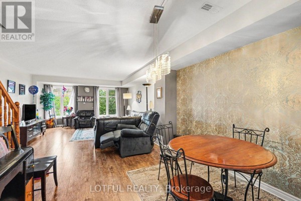 Living room - 20 - 585 Chapman Mills Drive, Ottawa, ON K2J5T1 Photo 3