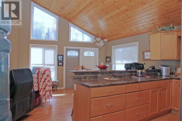 Living room - 20 Access Road, Ministikwan Lake, SK S0M3G0 Photo 3