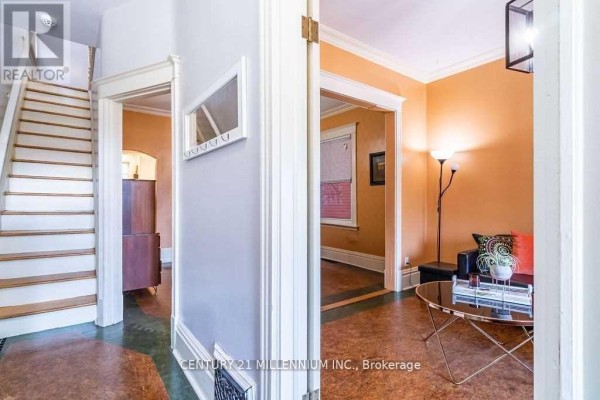 Hallway with white stairs, grey walls, and doorways leading to rooms. - 20 Dickson Street, Hamilton