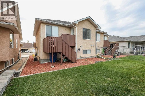 Family room - 20 Taylor Mews Se, Medicine Hat, AB T1B4N4 Photo 5
