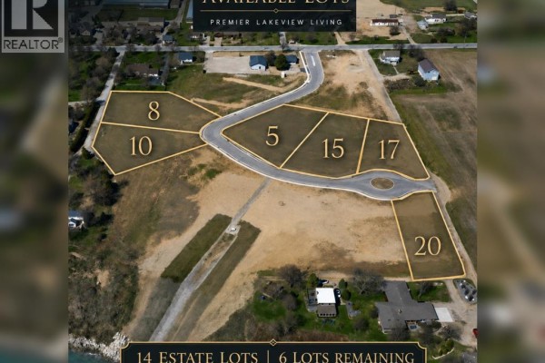Aerial view of land lots numbered 5, 8, 10, 15, 17, and 20, with lake views and surrounding development. - 20 Vista Isle Avenue, Leamington