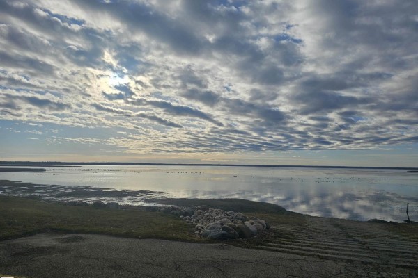 Scenic view of a calm lake under a cloudy sky - 200 55101 Ste Anne Trail, Rural Lac Ste  Anne County