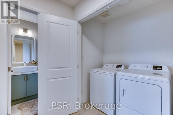 Washer, dryer, vanity, sink, and mirror - 200 Rivergreen Crescent Waterloo