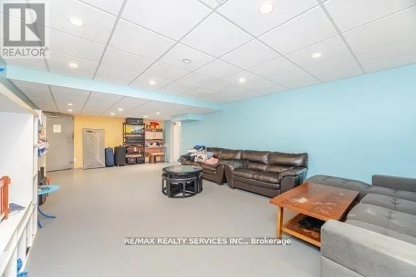 Finished basement with drop ceiling, recessed lighting, and living area - 20040 Kennedy Road Caledon
