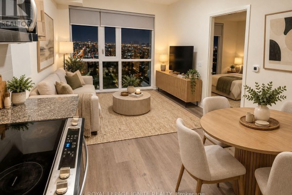 Living room with a sectional sofa and dining area, featuring large windows with city views. - 2008 - 10 Deerlick Court, Toronto
