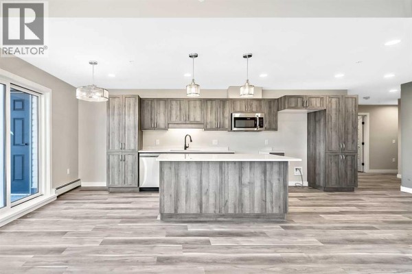 Living room - 201, 21 Ranchlands Boulevard Ne, Medicine Hat, AB T1C0E2 Photo 4