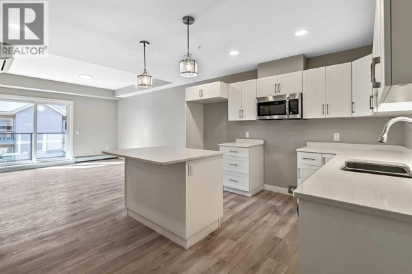 Laundry room - 201, 21 Ranchlands Boulevard Ne, Medicine Hat, AB T1C0E2 Photo 5