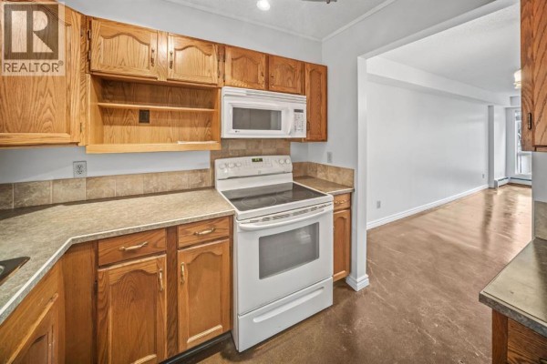 Dining room - 201, 2211 29 Street Sw, Calgary, AB T3E2K1 Photo 5