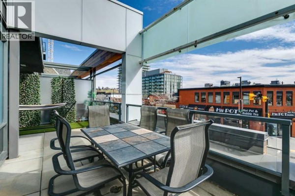 Living room - 201, 301 10 Street Nw, Calgary, AB T2N1V5 Photo 3