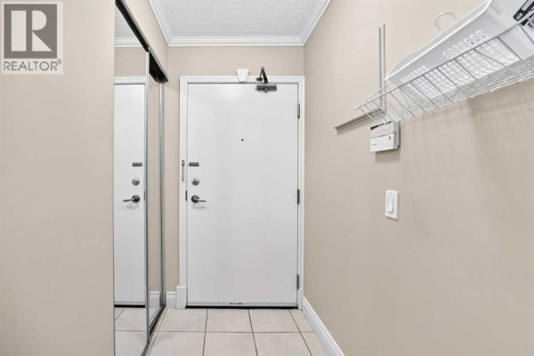 Primary Bedroom - 201, 4554 Valiant Drive Nw, Calgary, AB T3A2V5 Photo 5