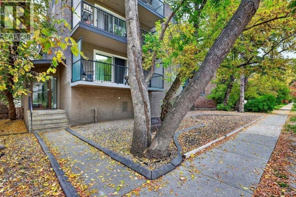 Primary Bedroom - 201, 709 3 Avenue Nw, Calgary, AB T2L0V7 Photo 4