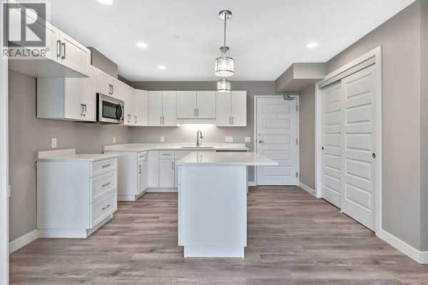 Bedroom - 201, 97 Station Drive, Sylvan Lake, AB T4S0S6 Photo 2