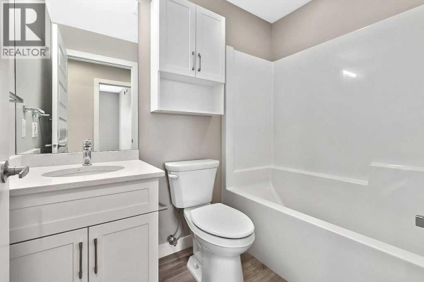 Living room - 201, 97 Station Drive, Sylvan Lake, AB T4S0S6 Photo 3